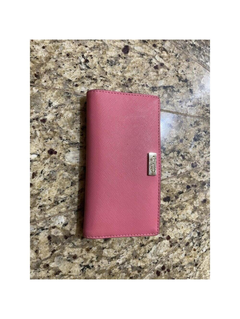 Kate Spade Stacy slim bifold wallet in pink saffiano leather